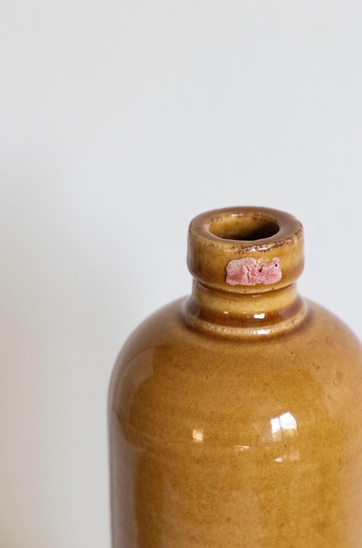 Enamelled stoneware bottle