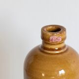 Enamelled stoneware bottle
