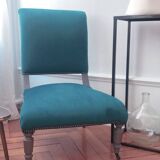 Velvet and studded armchair