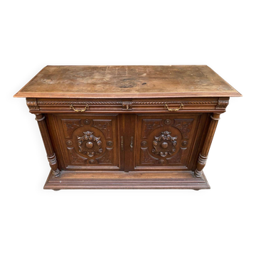 Henri II sideboard in carved wood, 1930.