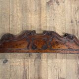 Cornice pediment in low relief in wood