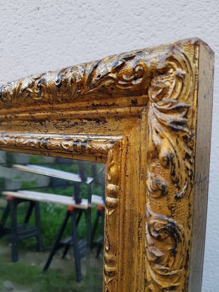 Grand golden mirror in louis xvi style