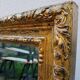 Grand golden mirror in louis xvi style