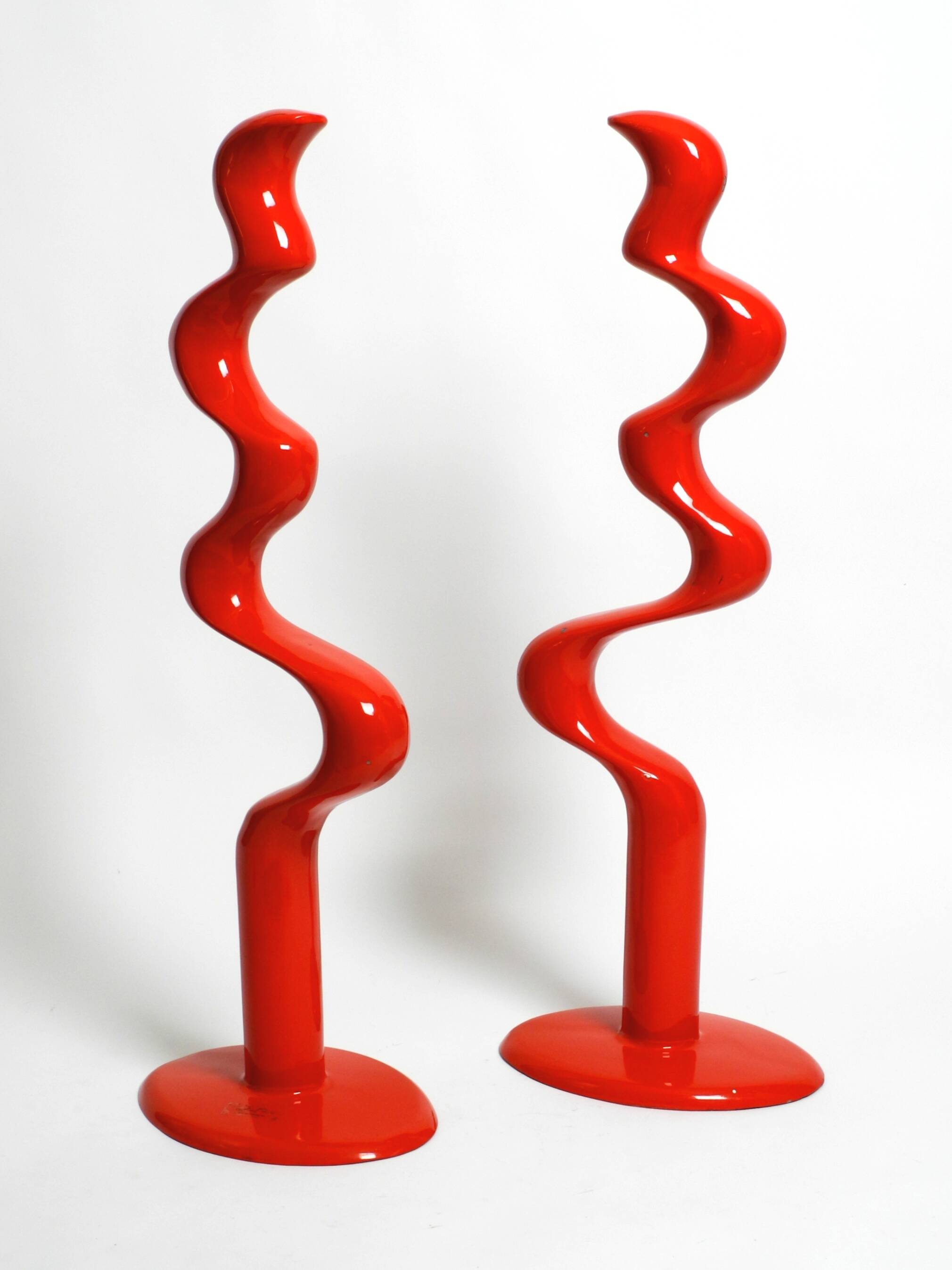 Two large limited abstract metal floor sculptures in red