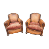 Paire de fauteuils club cuir "punk" dossier moustache
