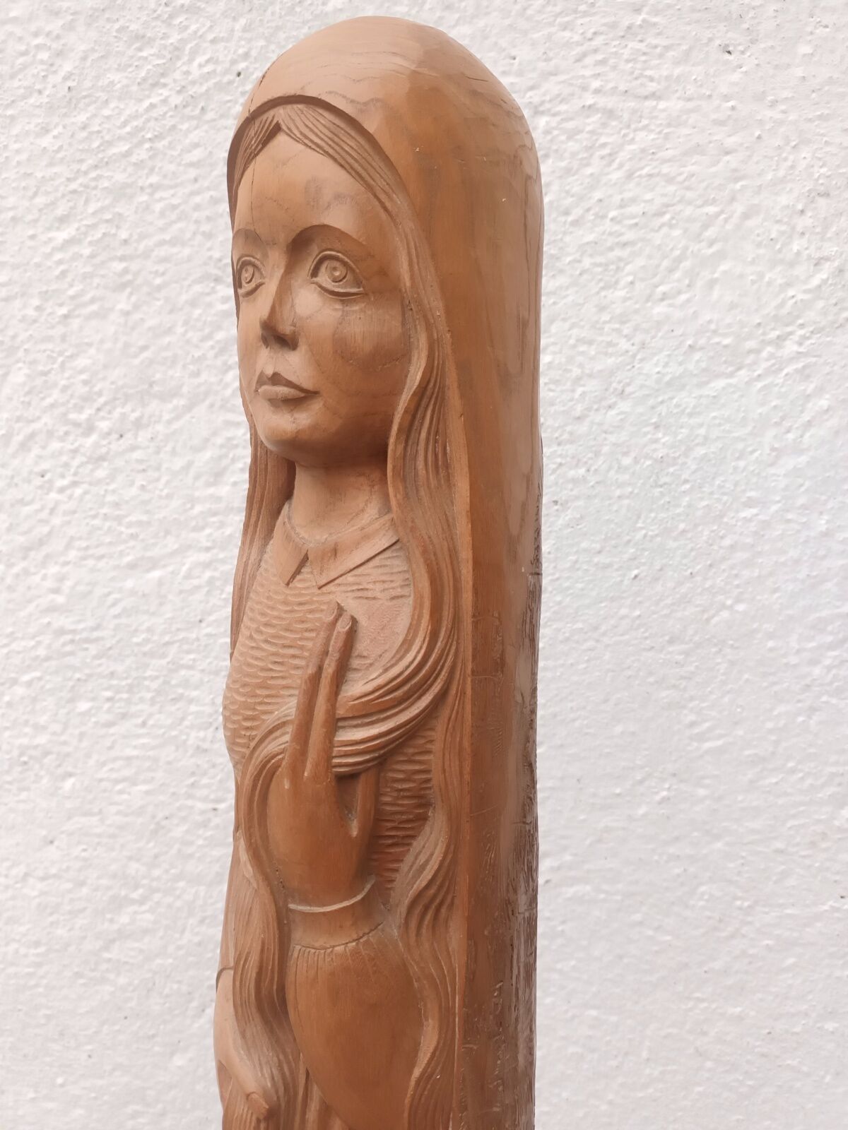 Young woman sculpture by Ray Boterf