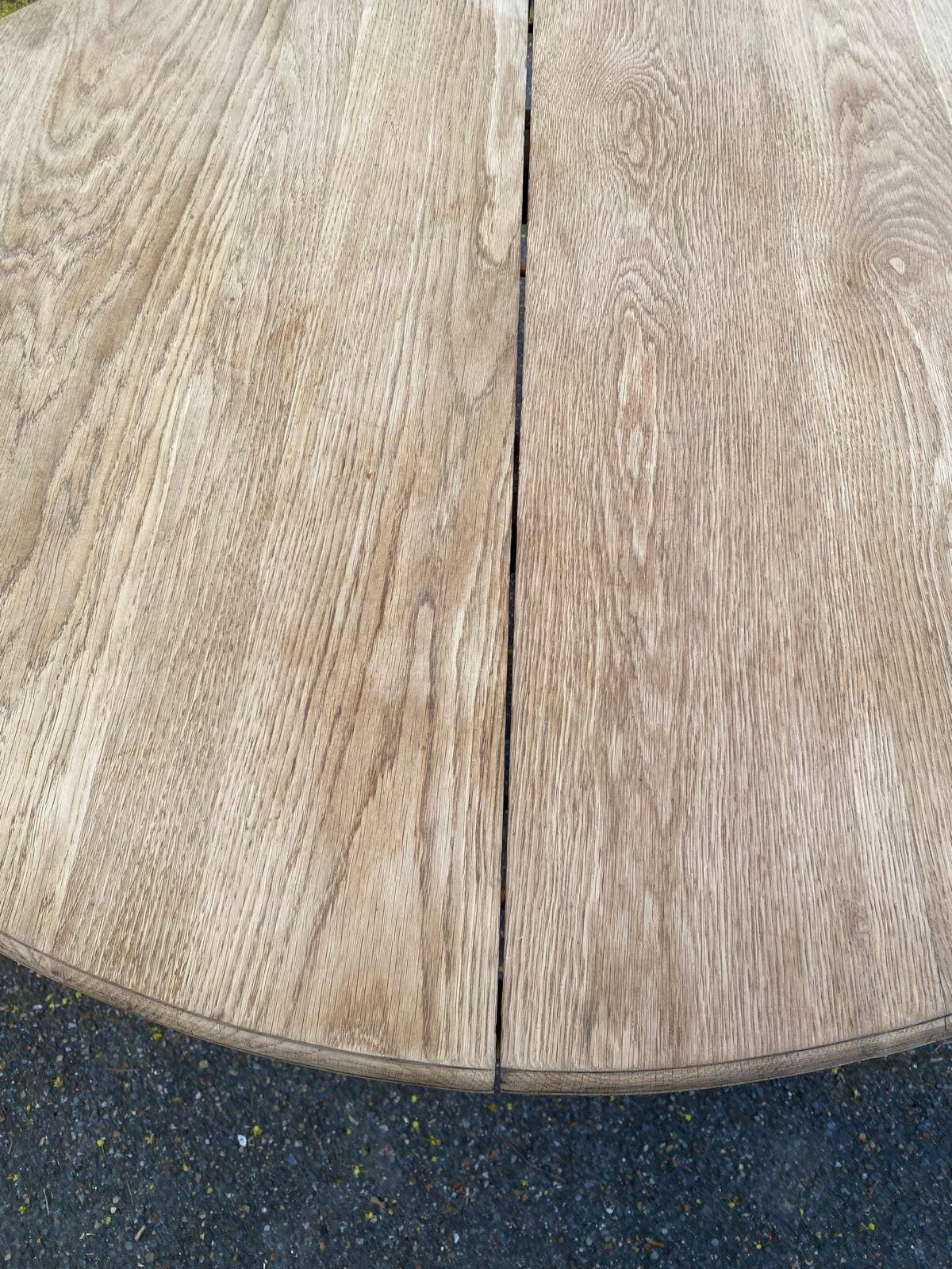 Renovated round Art Deco dining table, extendable, made of solid oak, 213cm.