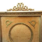 Empire square frame, in gilded bronze, Louis XVI knots, photo medallion