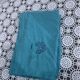4 white linen napkins, emerald tinted, embroidered with flowers and monogrammed, old GM