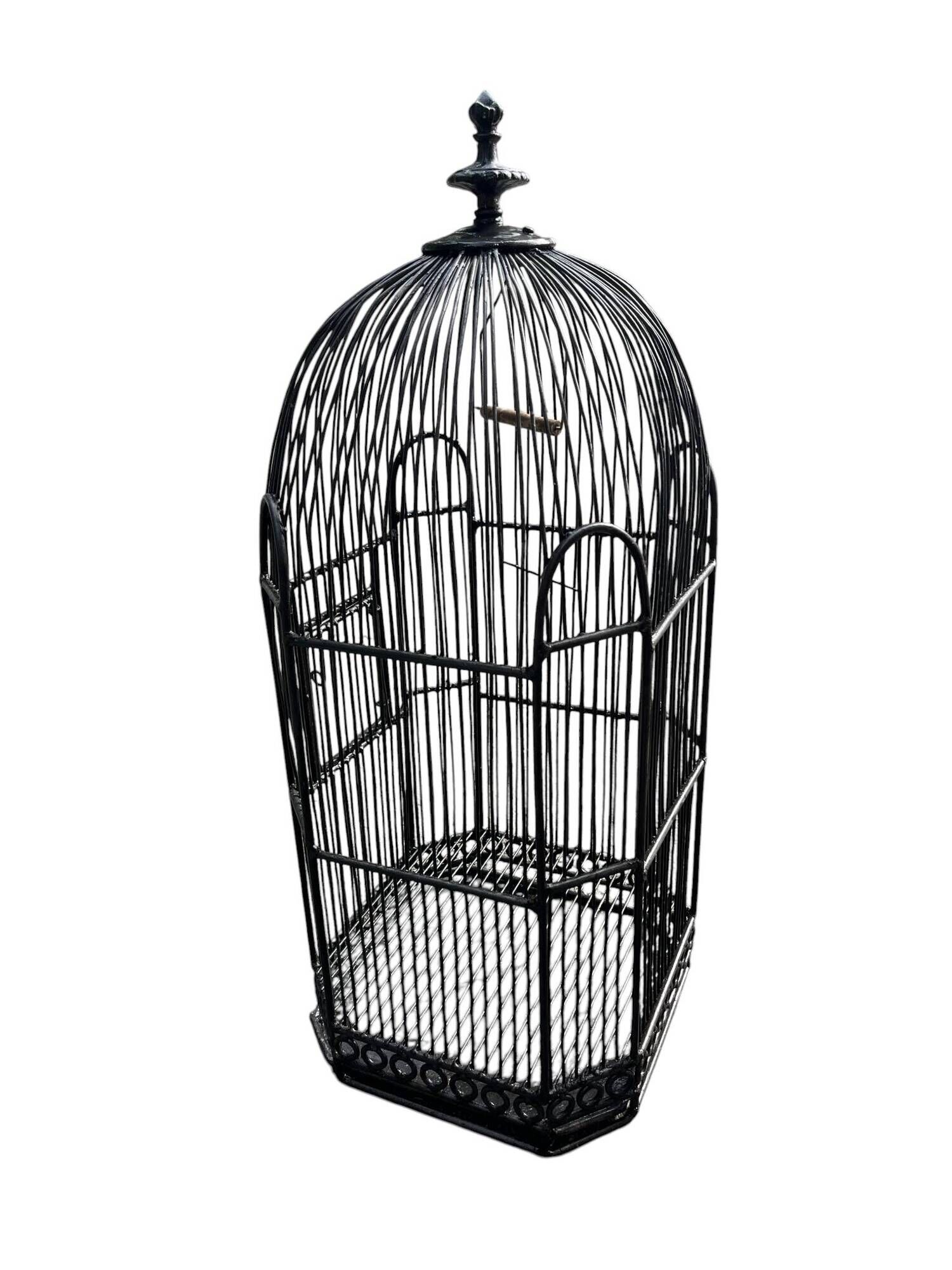 Old black metal birdcage from the early 20th century.