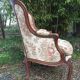 Fauteuil Louis XV dit rocaille en noyer