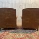 Paire de fauteuils Club en imitation cuir