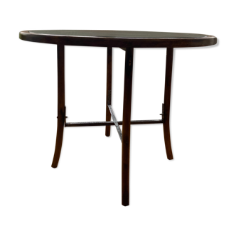 Roundtable in rattan and glass