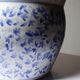 Vintage Chinese cache-pot in blue and white porcelain with a floral design.