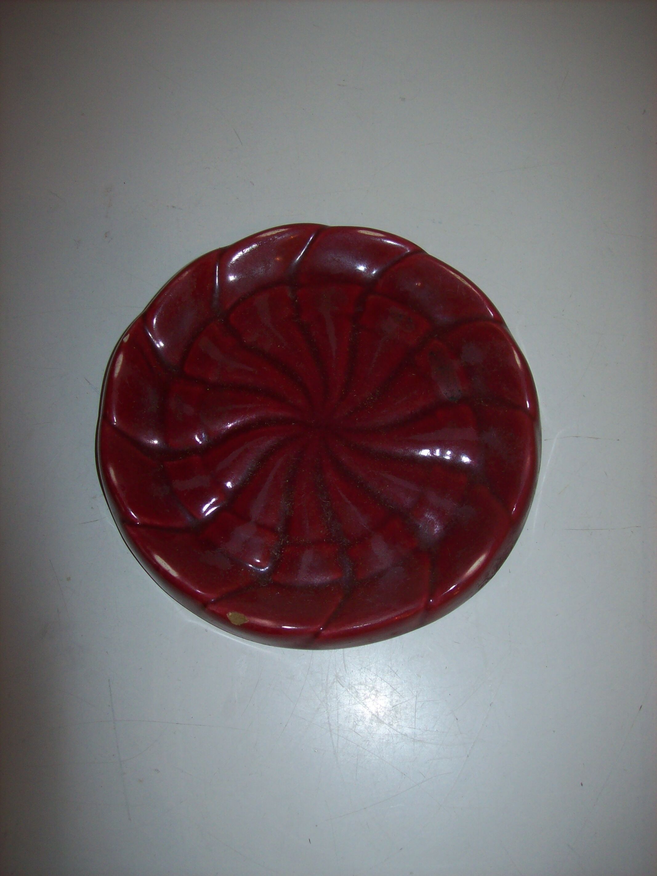 Ceramic under bottle