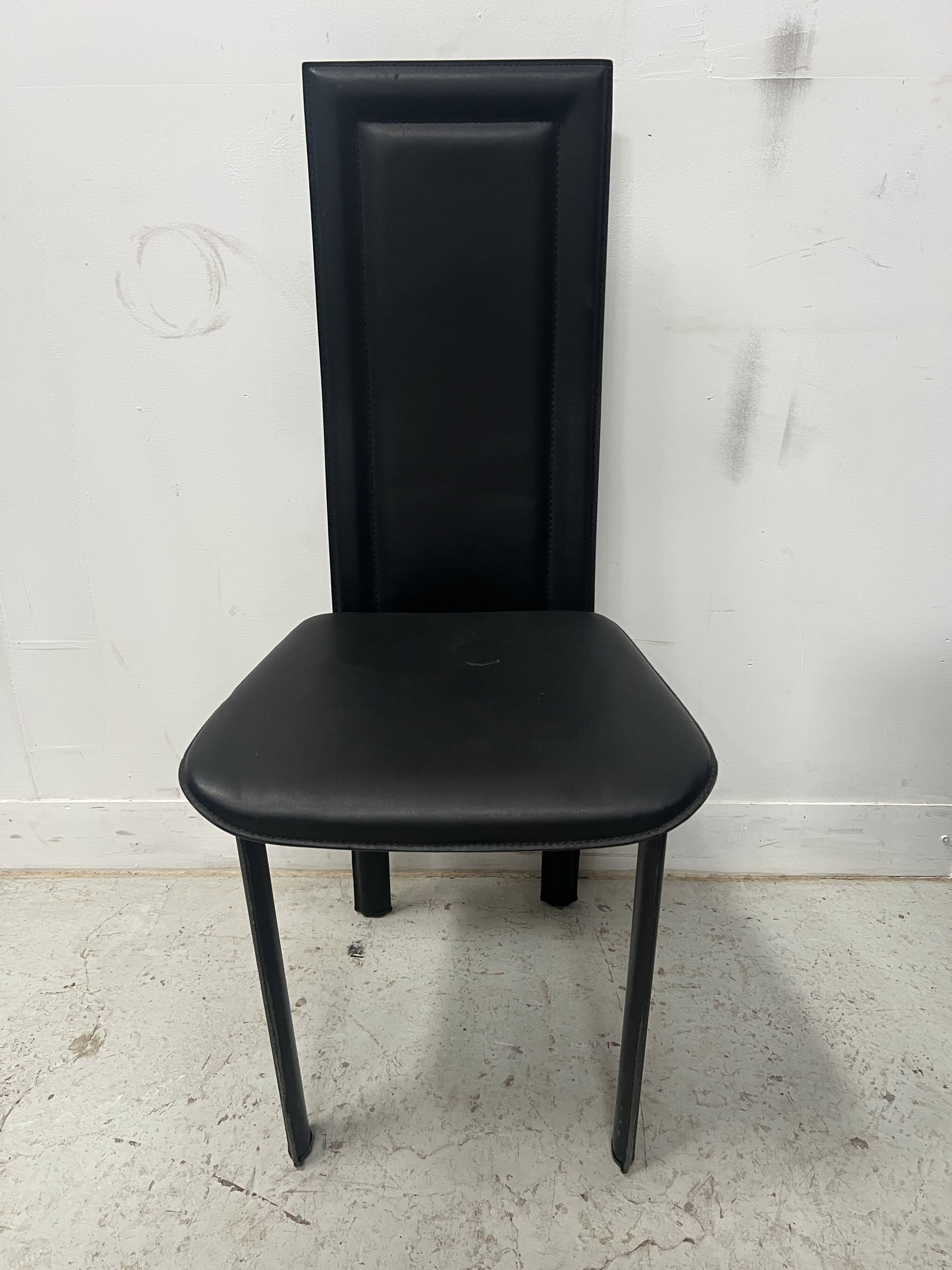 Set of eight designer chairs in black leather from the 20th century