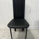 Set of eight designer chairs in black leather from the 20th century