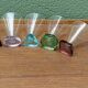 Set of 5 designer wine glasses, colored feet