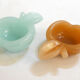 Pair of Apple opalin ashtrays