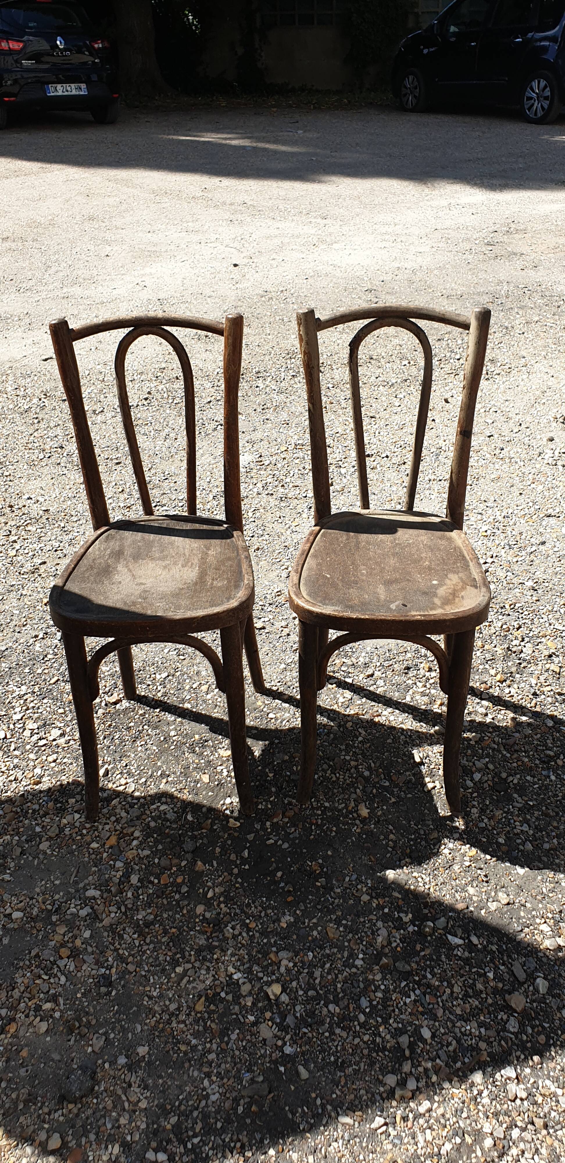 Pair of curved wood bistro chairs
