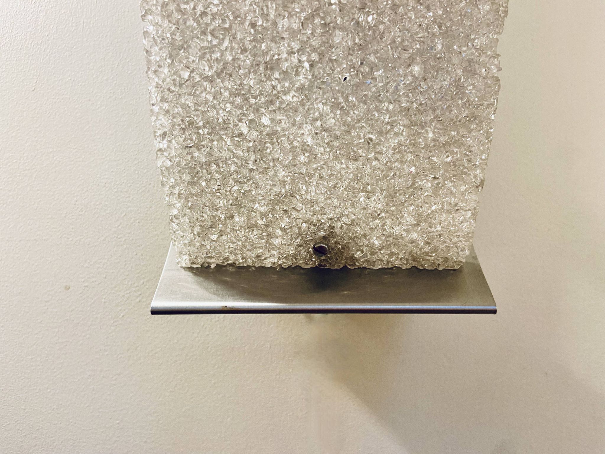 Pair of brushed steel and perspex wall lights, circa 1970.