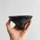 Small black glass cup
