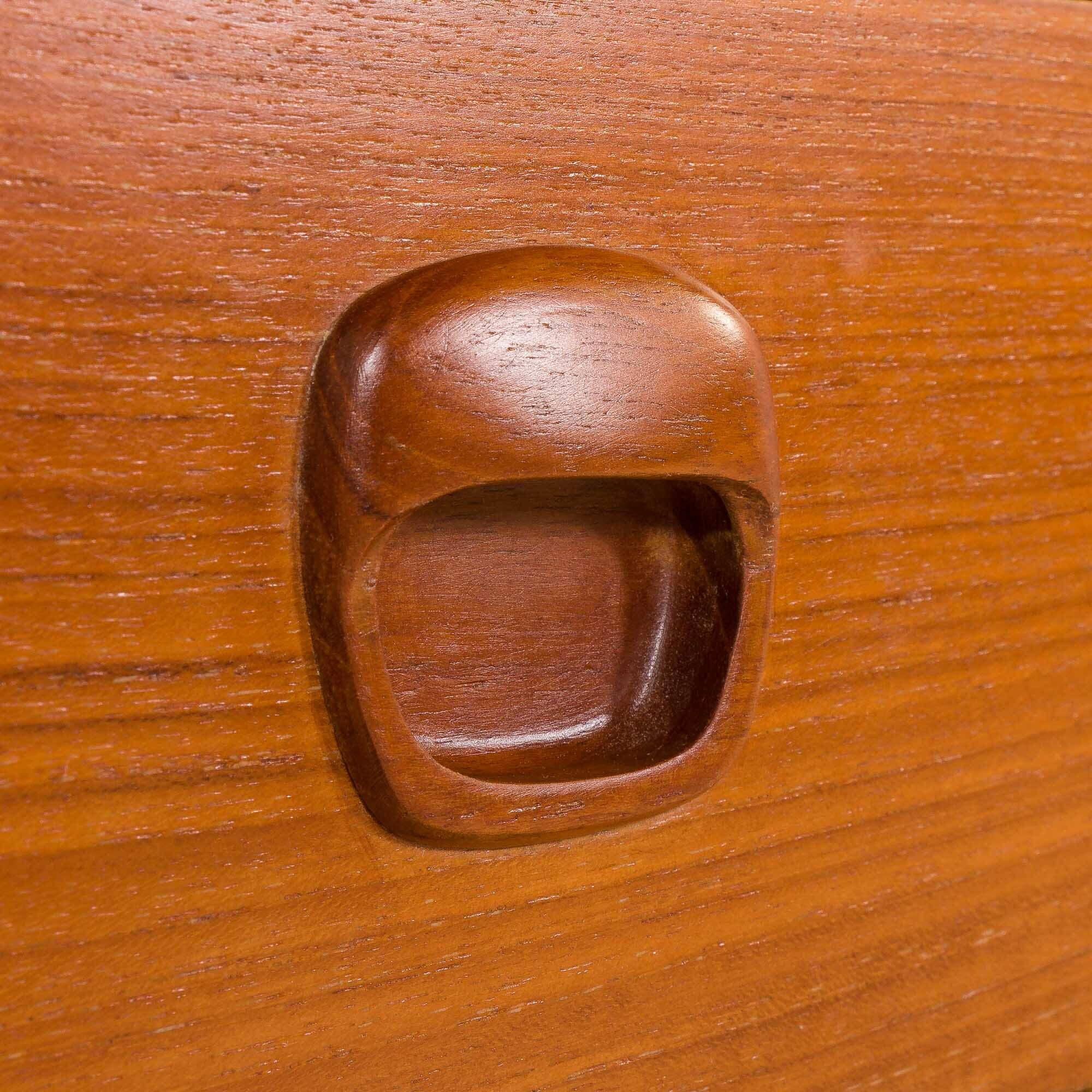 Danish teak wall unit in the style of Cadovius, Sorensen with a lamp, 1970s