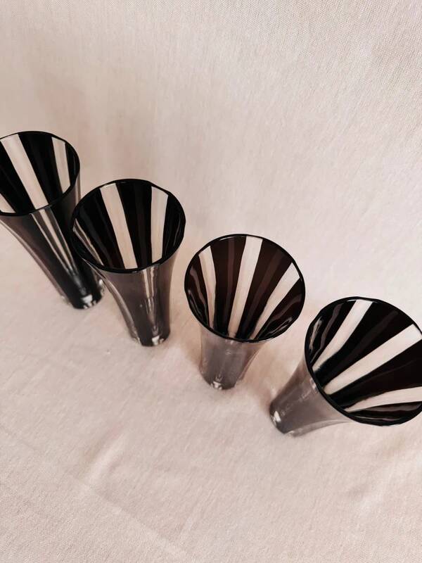 4 vintage champagne flutes in clear and black crystal glass