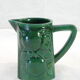 Pitcher vintage green slurry in faience of st clement with fruit