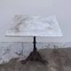 Bistro pedestal table in marble and cast iron lion paws