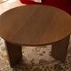 Round table in dark oak veneer