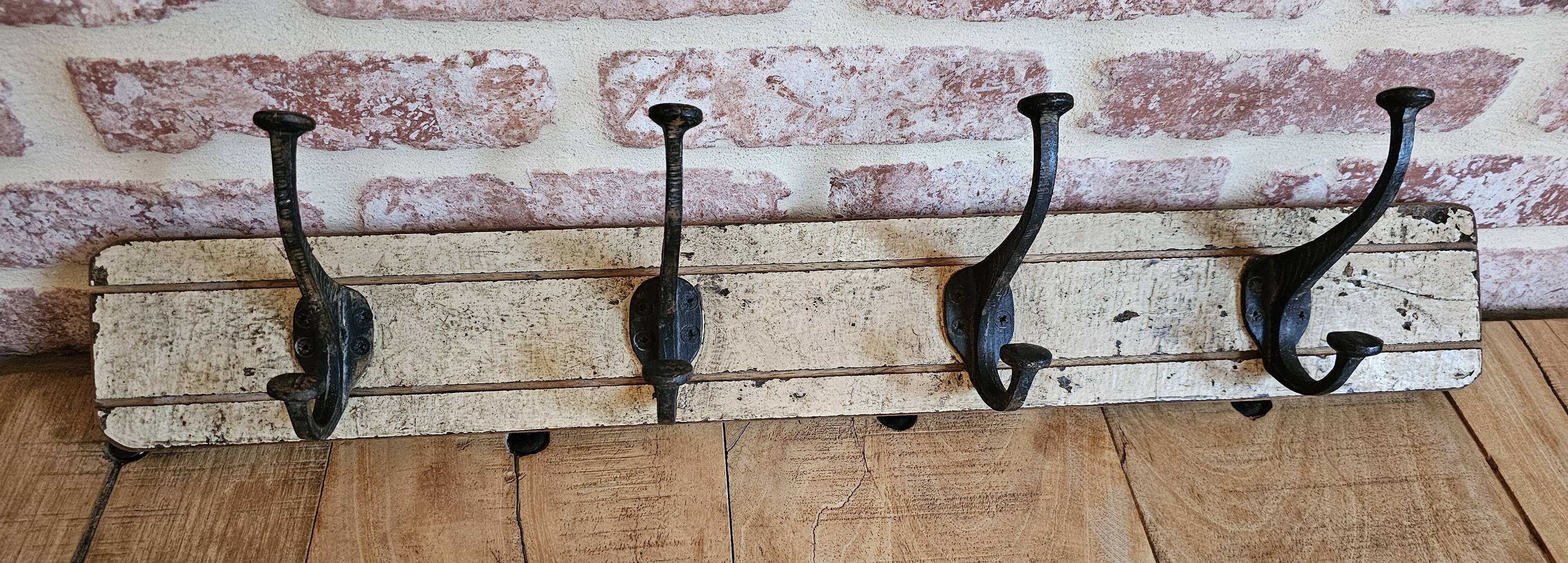 Solid teak coat hook with 4 double cast iron hooks