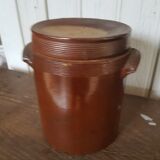 Old sandstone pot with lid
