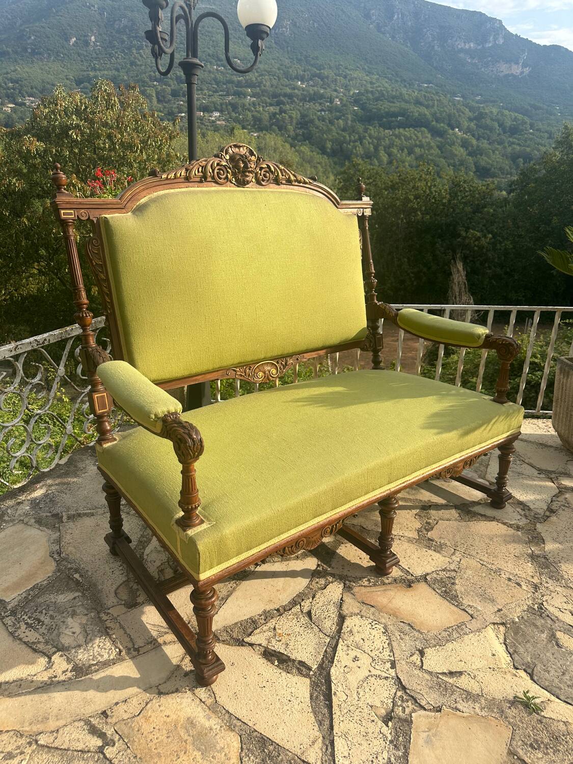 Richly carved solid wood bench in Louis XVI style.