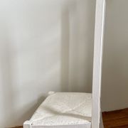 Old white mulched wooden chair