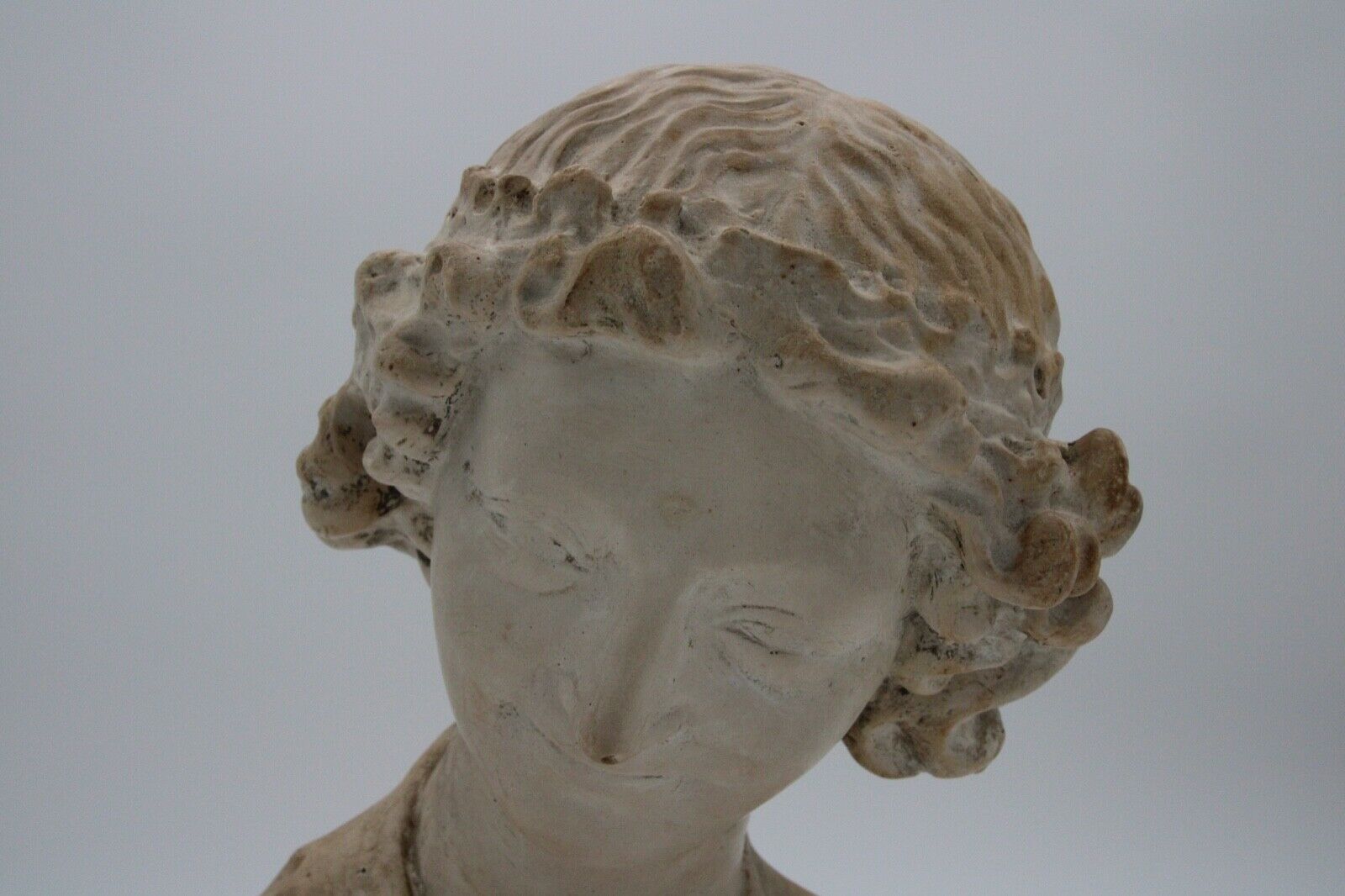 Bust in flat woman renaissance late 19th hair drapes