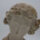 Bust in flat woman renaissance late 19th hair drapes