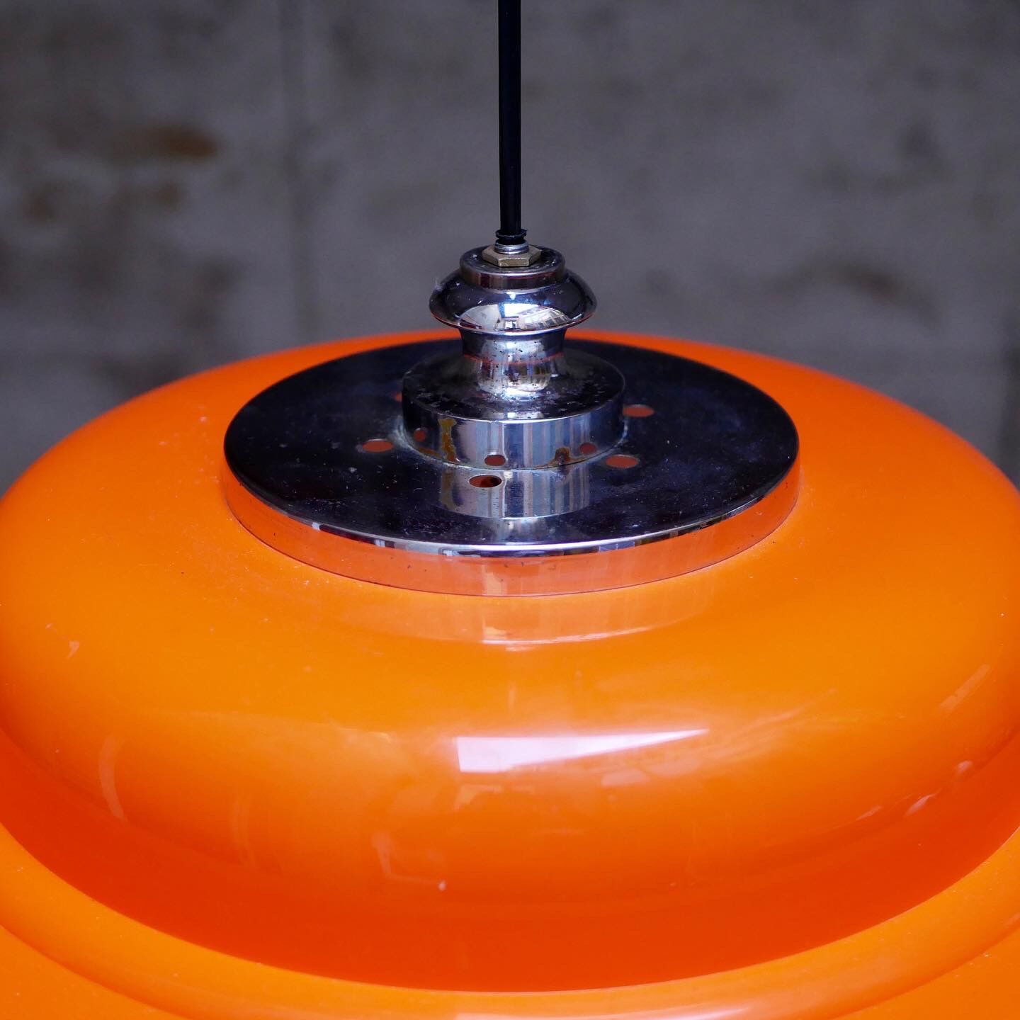 Orange space age suspension