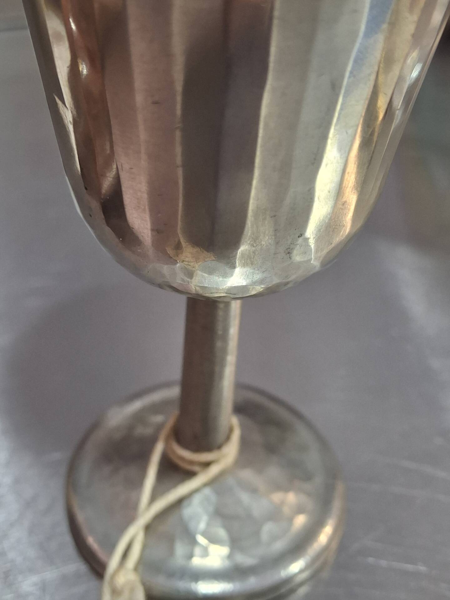 Footed glass in pewter