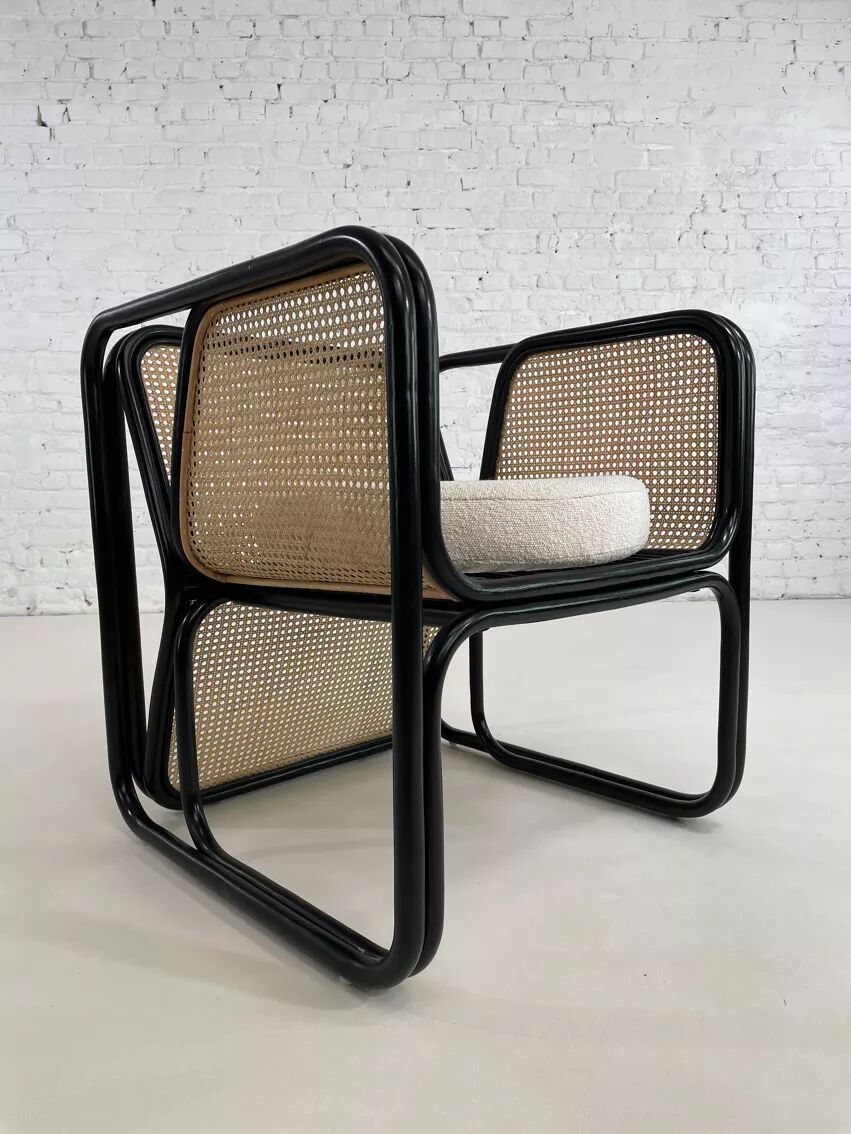 Cubic armchair in black rattan and canework