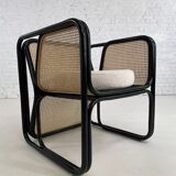 Cubic armchair in black rattan and canework