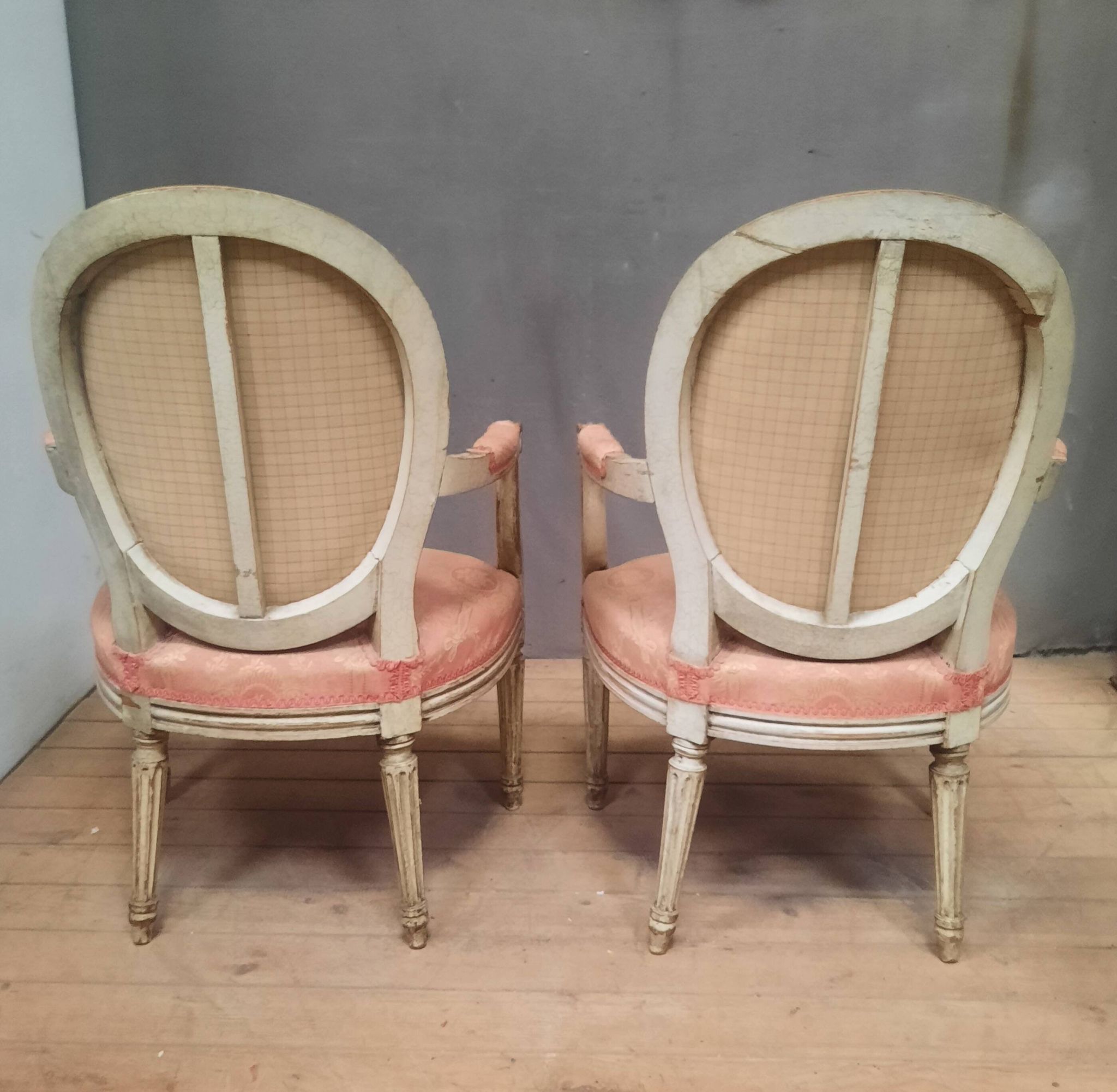 Pair of Louis XVI style medallion armchairs