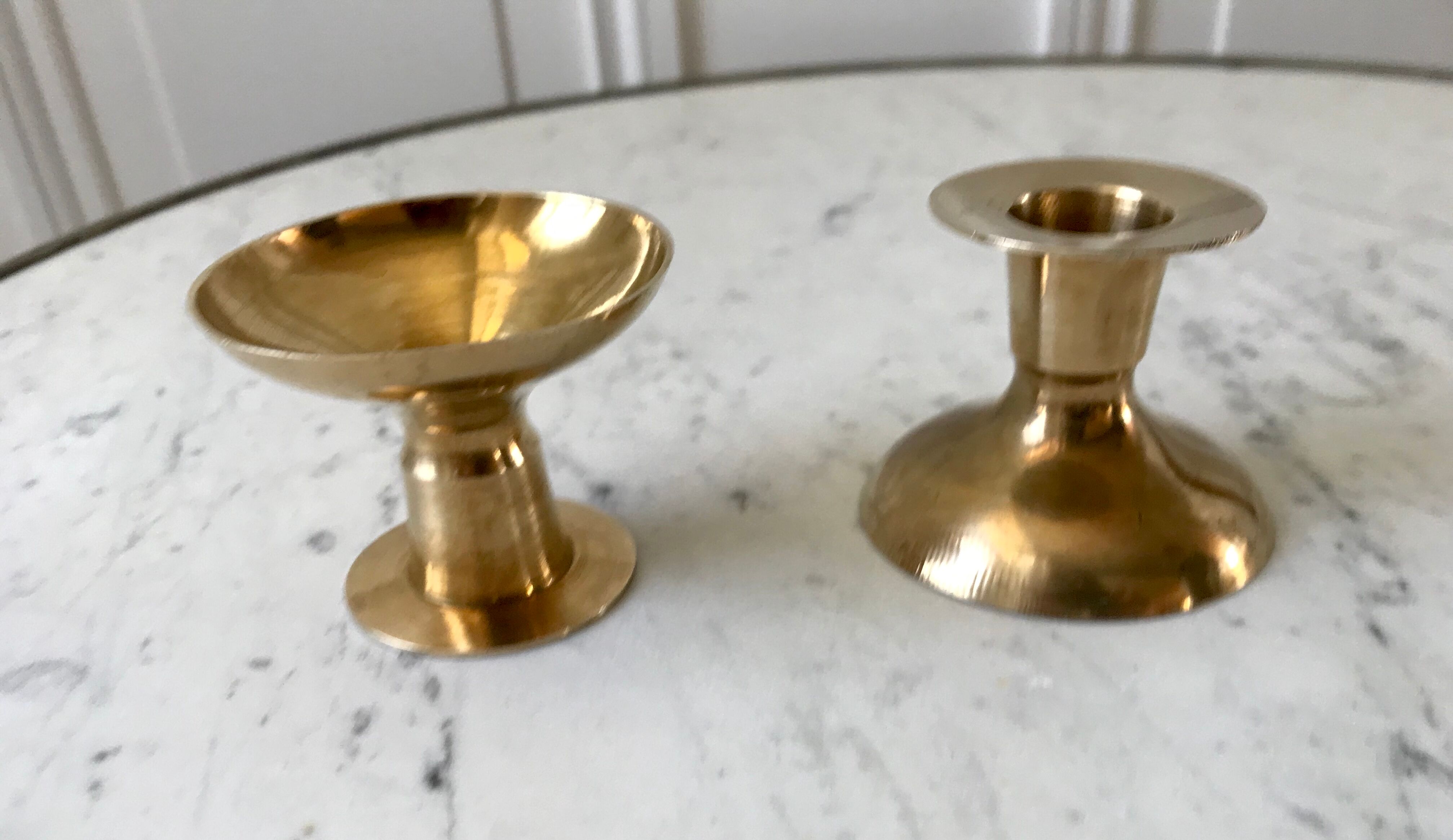 Duo of brass candle holders 20s