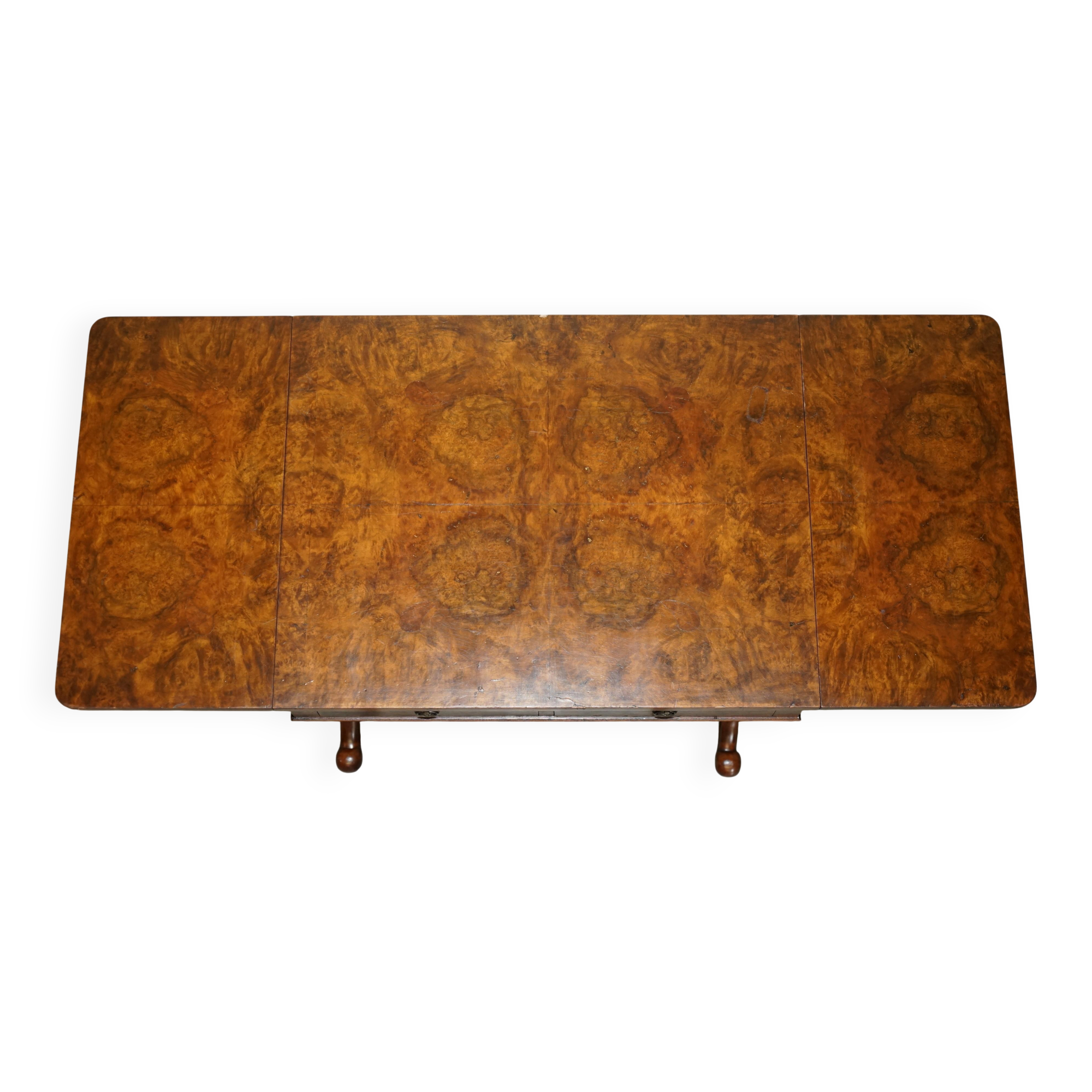 Antique extendable coffee table circa 1880 in solid walnut.