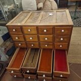 Antique craft cabinet with solid oak drawers and porcelain handles