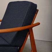 Pair Scandinavian Modern armchairs in teak and dark blue bouclé fabric