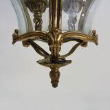 Old lantern with 3 faces, chandelier in gilded bronze and curved glass. Year 60