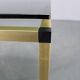 Table basse italienne des années 1970 avec finition en laiton et plateau en verre fumé