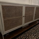 White wooden sideboard and canning