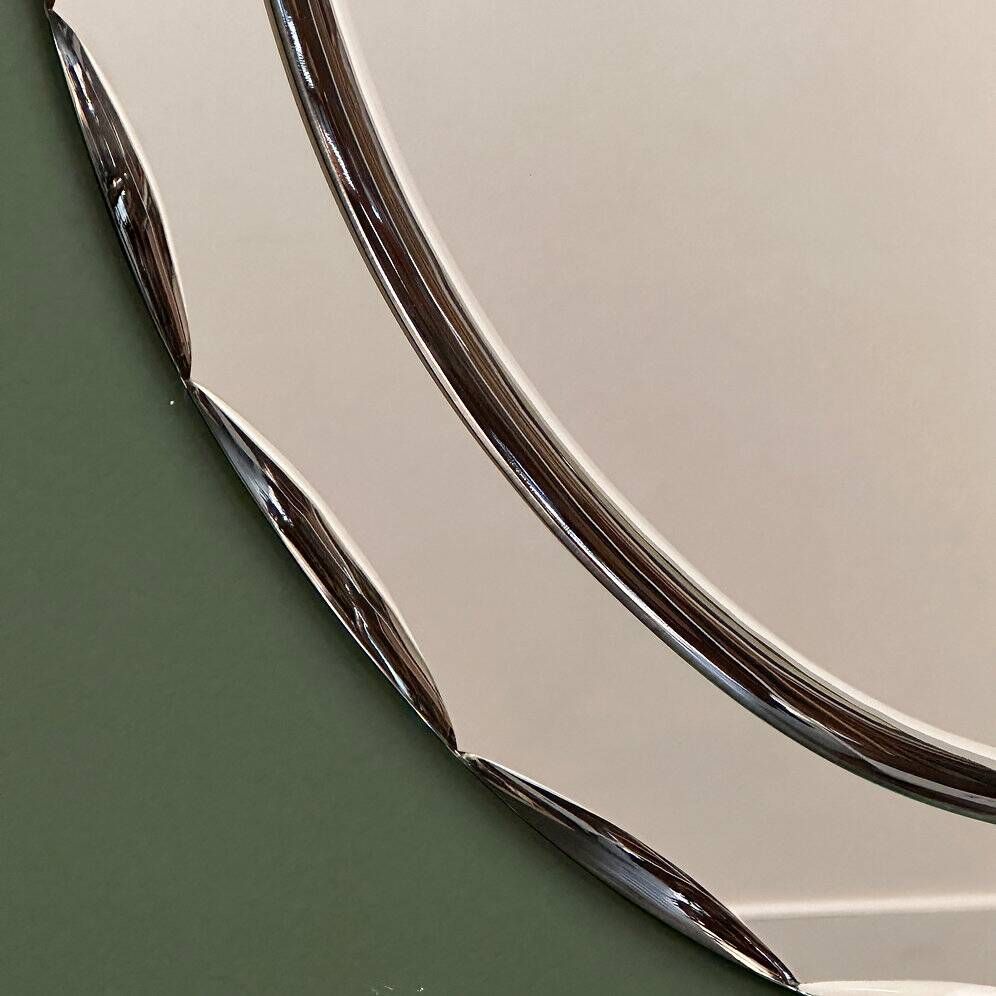 1970s Italian oval mirror by Crystal Arte with faceted glass frame